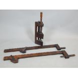 Victorian mahogany carpenters mitre box vice clamp, 52cm h., and a pair of similar larger ratchet