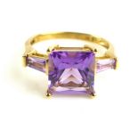 Art Deco style 9ct yellow gold amethyst three stone dress ring of approximately 5.2ct