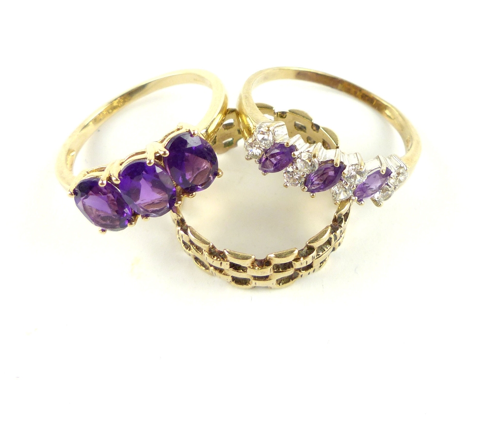 Two 9ct yellow gold purple and white stone dress rings and a 9ct woven band. (3)