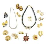 Collection of costume jewellery, to include earrings, brooches and necklaces by Givenchy, Butler &