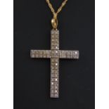 9ct yellow gold diamond cross pendant on a 9ct fine link chain, diamond weight 1ct.