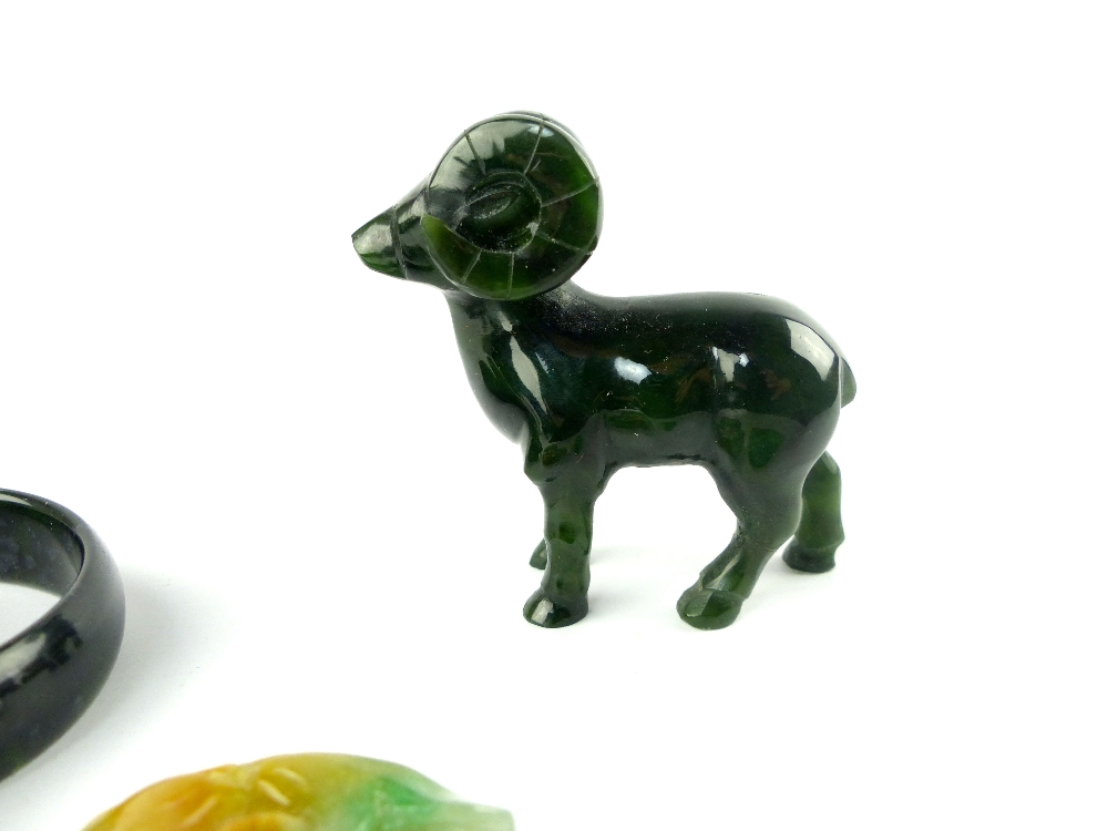 Collection of Chinese and Asian carved jade and jadeite comprising a model of a ram, two bangles and - Image 3 of 5