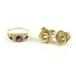 9ct yellow gold garnet and white stone dress ring and a pair of yellow metal knot ear studs.