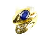 14ct yellow gold sapphire and white stone contemporary set ring.