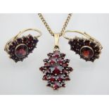 Pair of gilt over silver garnet earrings, together with matching necklace and garnet pendant