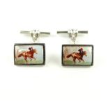Pair of cuff links, the plaques bearing images of horses with chain a bar backs, stamped 925