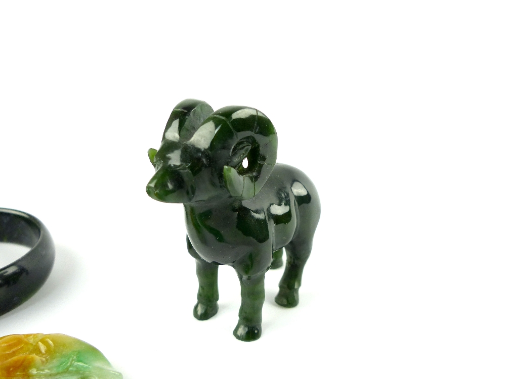 Collection of Chinese and Asian carved jade and jadeite comprising a model of a ram, two bangles and - Image 2 of 5