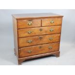 George III walnut chest of drawers, with an arrangement of two short and three long drawers,