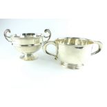 Silver bowl, Birmingham 1915, with twin handles and a girdle raised on a foot,