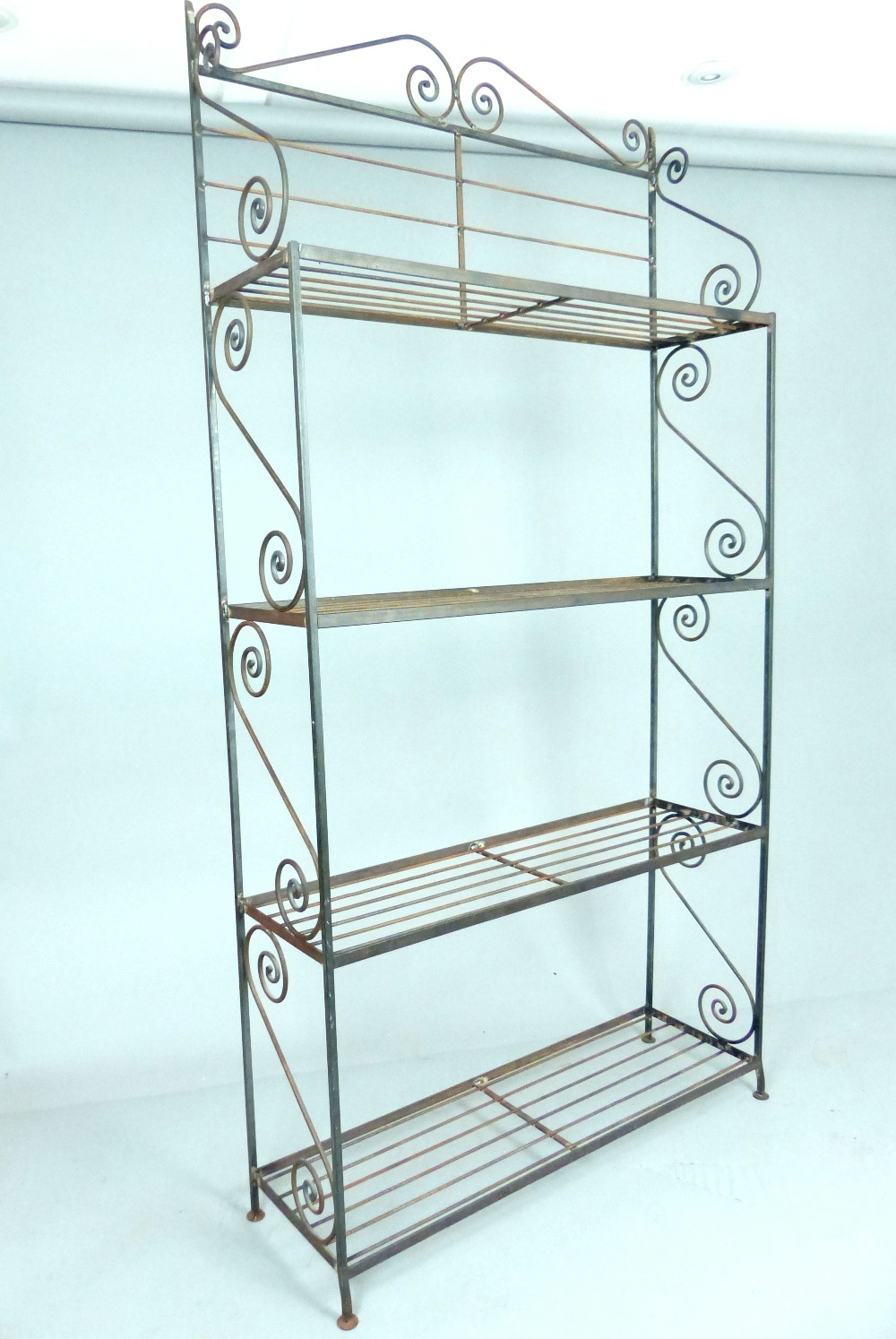 Scroll iron work baker's rack, four open shelves, 202 x 100cm.