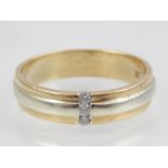 9ct yellow and white gold diamond three stone band.