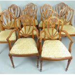 Set of ten loopback dining chairs, Prince of Wales feathers, tapering reeded legs.