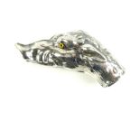 White metal cane handle modelled as a hog, set with yellow glass eyes.