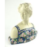 Longwy style bust of a young woman wearing a floral dress,