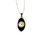 Silver and enamel oval cased pendant watch, on a fine bar and link chain.