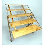 Industrial metamorphic shelving, five pitch pine shelves, bronze finish steel and iron frame,