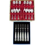 Cased set of twelve George V silver trefid tea spoons and tongs, Martin Hall & Co, Sheffield 1925,