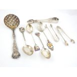 Victorian silver sifter spoon, London 1863, with a foliate handle and a gilded bowl,
