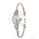 Ladies 14ct white gold and diamond wristwatch by Universal of Geneve,