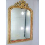 Victorian giltwood and gesso pier glass with floral shell and songbird pediment over an arched