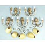 Set of five twin arm wall lights.