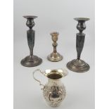 Sterling silver pair of candlesticks,