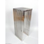 Polished steel contemporary slotted hall stand, 90 x 34 cm.