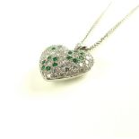 Diamond and emerald heart shaped pendant, on a fine link chain, set in 18ct white gold, 12.