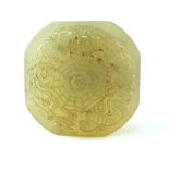 Chinese green jade desk seal, octagonal with carvings of dragon and phoenix, 5cm w.