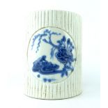 Chinese brush po, cream and glaze of faux bamboo form, blue floral motif, raised ceramic stamp, 13.