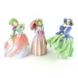 Royal Doulton figure, Miss Demure HN1402, 19cm h, together with two other figures Autumn Breezes