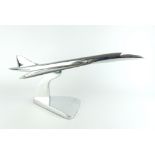 Contemporary brushed steel model of the airplane Concord, on stand, 46cm C.