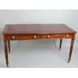 Library table in the manner of Gillows, 19th C mahogany, claret leather insert with gilt tooling,