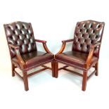 Pair of library / study chairs, claret leather buttonbacks, padded arm rests, mahogany frame (2)