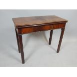 George III mahogany tea table, the rectangular top above a gateleg action and moulded square legs,
