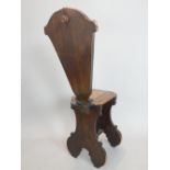 Dutch 19th C hall chair, oak scroll and shell decorated frame with satinwood panels to back and