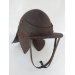 19th C Cromwellian style lobster tail helmet with ear pieces