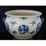 Chinese blue and white porcelain jardiniere, beast handles and dragon, stylised cloud design,