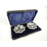 Pair of silver bon bon dishes Birmingham 1913, repousse and pierced foliate decoration,