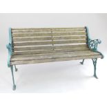 20th century garden bench, with cast metal end supports and a wooden lathe seat,