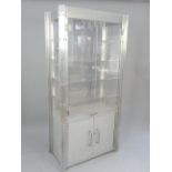 Contemporary rectangular double door acetate and riveted aluminium display cabinet,