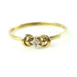 9ct yellow gold dress ring, set with diamond to centre on a fine band, 1.