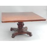 19th C rosewood supper table, octagonal and bulbous stem, quadripartite base with scroll feet,