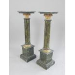 Pair of green marble and gilt metal mounted columns,