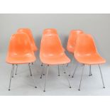 Set of six Herman Miller chairs, c 1960, orange fibreglass on steel legs,