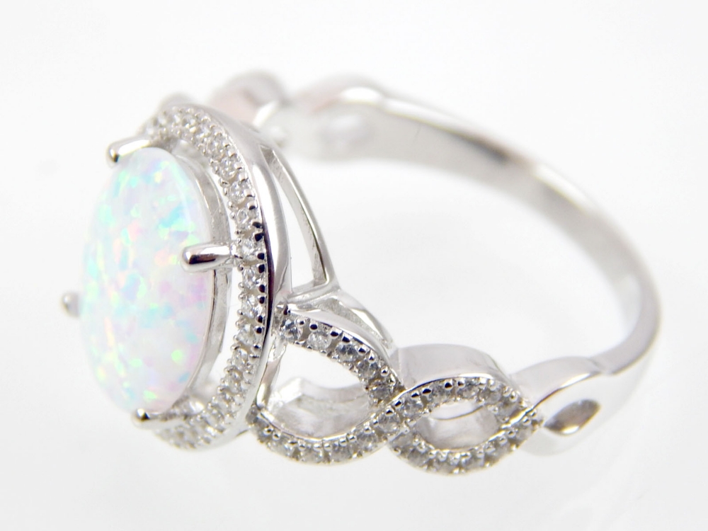 Silver and cubic zirconia ring with oval white opalite stone - Image 2 of 2