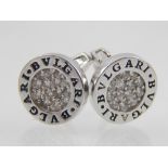 A pair of silver and cubic zirconia stud earrings