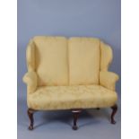 George II style wing upholstered two seat chair back sofa,