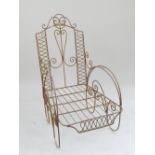 1920s garden chair, scroll arms and back, arch feet,