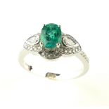 18ct white gold, emerald and diamond cluster ring,
